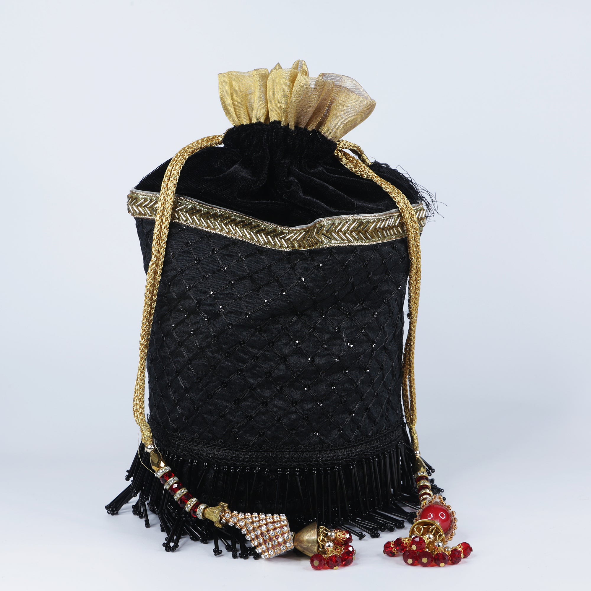Handmade women's traditional purse - batua / potli handbag, of silk / Banarasi zari fabric to pair with wedding / party attire. Great accessory for Indian dresses.