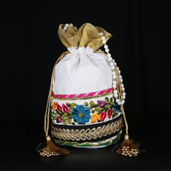 Handmade women's traditional purse - batua / potli handbag, of silk / Banarasi zari fabric to pair with wedding / party attire. Great accessory for Indian dresses.